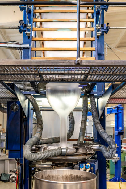 istock blowing plastic into a plastic roll for the production of polyethylene packaging 1466303435
