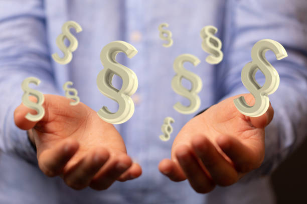 istock 3d modeling of white law and justice conceptual figures over humans hands 1466303541