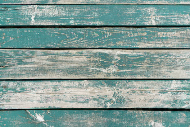 istock Turquoise weathered aged wooden background 1466304469