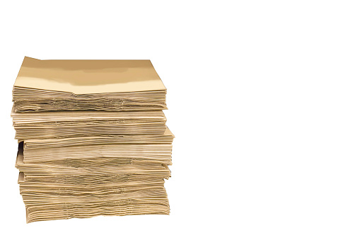 Stack of recycle of brown paper isolated on white background.