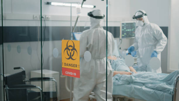 istock Paramedics wearing protection in lockdown zone at clinic 1466306222