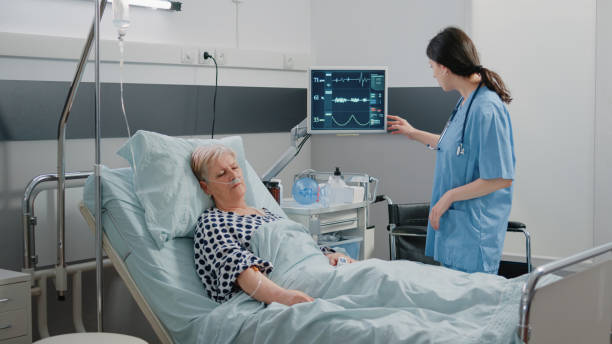 istock Medical assistant visiting retired patient sleeping 1466307087