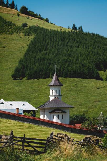 istock Vertical shot of a monastery surrounded by green hills. 1466308024