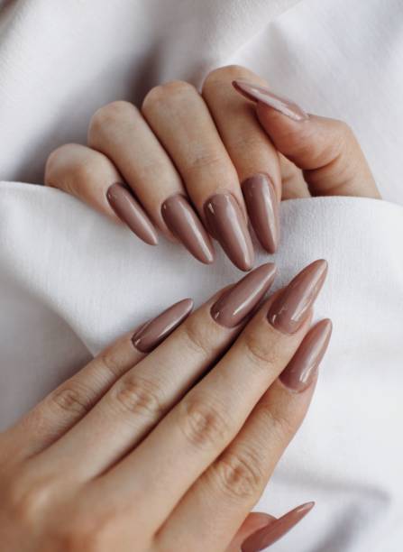 istock Vertical shot of the elegant long khaki nails 1466310168