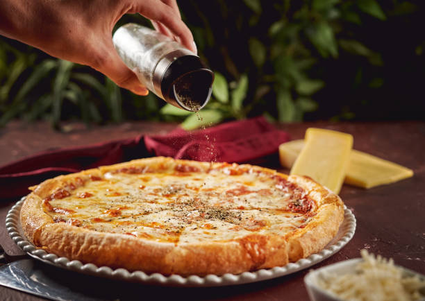 istock Closeup shot of pizza 1466310257