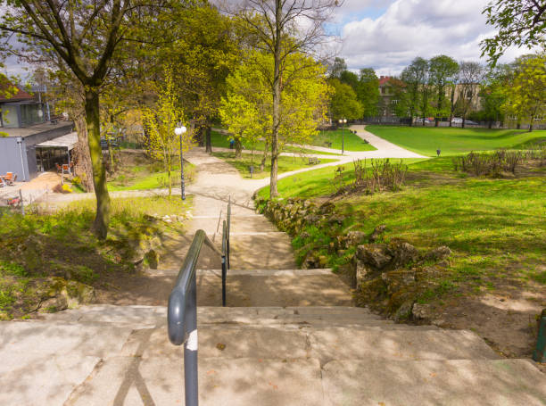 istock Stone steps with steel handrail in a park 1466311289