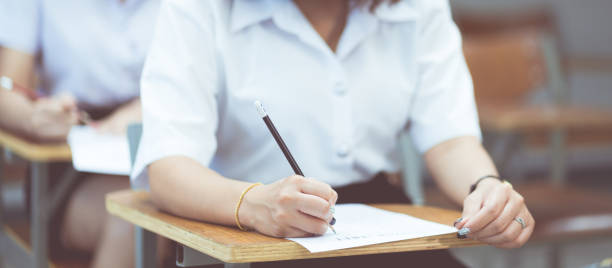 istock Closeup shot of a female student taking notes 1466313762