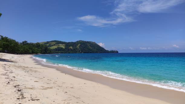 istock beach view with clouds and hills 1466318375