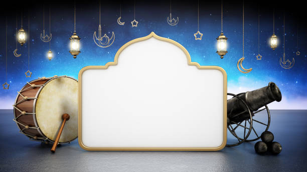 Traditional Ramadan drum and cannon standing next to mosque shaped blank text area. Hanging decoration on the night background.