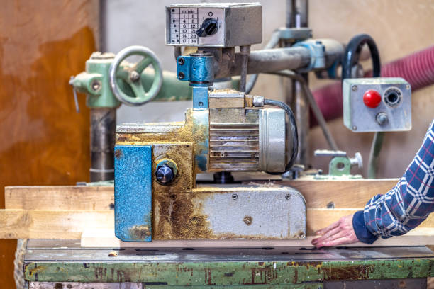 istock making furniture on a machine in a joinery 1466319240
