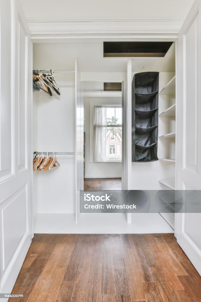 White Tall Cabinet Or Closet In A New House Stock Photo - Download Image  Now - Apartment, Architecture, Closet - iStock