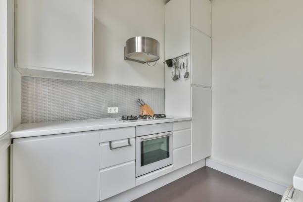 istock Kitchen with new white furniture 1466320807