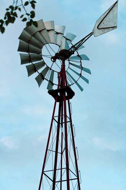 istock Old water pump windmill in a farm 1466320892