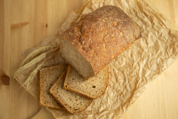 istock Fresh homemade bread cut into slices in a kitchen 1466321697