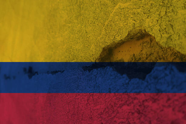 istock Colombia flag on cracked wall. Earthquake or drought concept 1466322153
