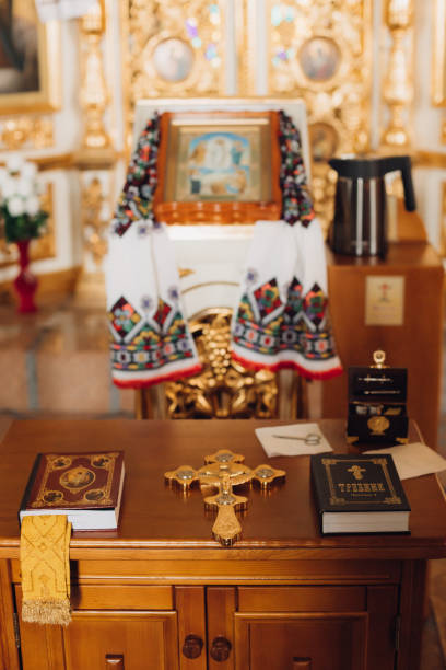 istock Prayer books with cross and scissors for the baptismal ceremony 1466322331