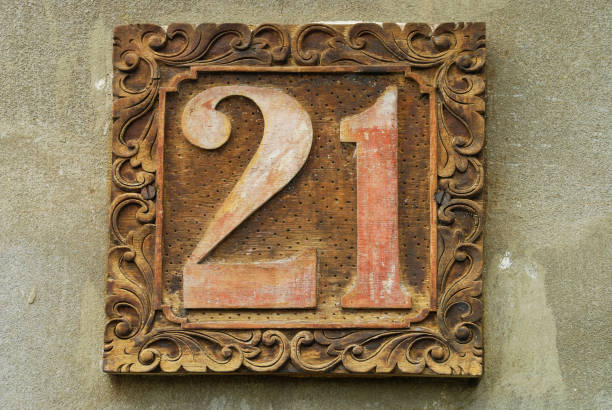 Aged wooden address sign with 