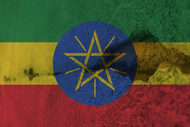 istock Ethiopia flag on cracked wall. Earthquake or drought concept 1466323537