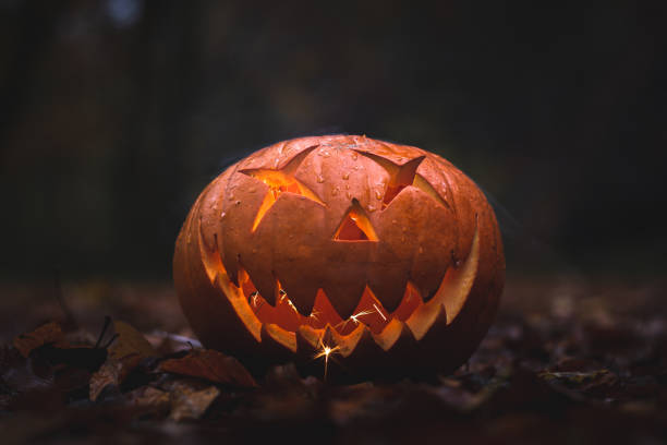 istock Scary pumpkin face in the dark 1466326259
