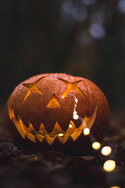 istock Scary pumpkin face in the dark 1466326263