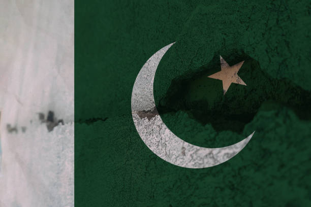 istock Pakistan flag on cracked wall. Earthquake or drought concept 1466328299