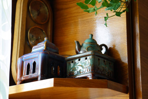 istock Teapots on the wooden shelf 1466329634