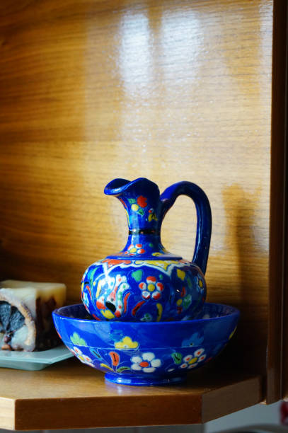 istock Vertical shot of decorative blue ceramic vase on a table 1466329640