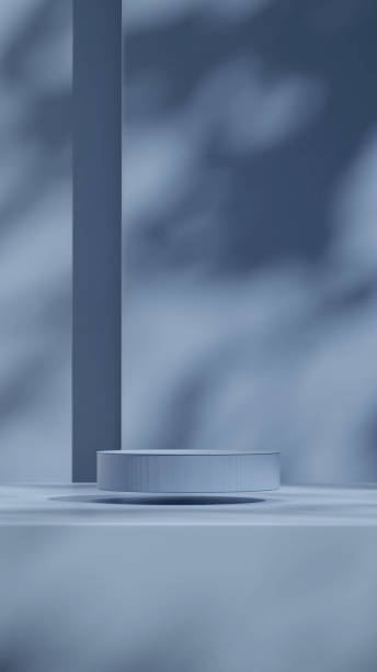 istock mockup  space of float round cylinder podium in portrait minimal shadow blue wall 3D image render 1466330270