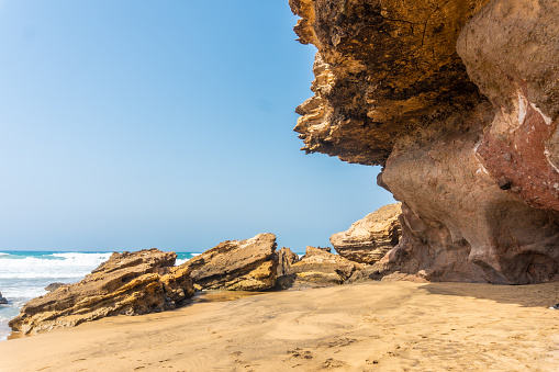 Big natural rock formations by the sea in Playa de Garcey, Fuerteventura, Canary Islands, Spain