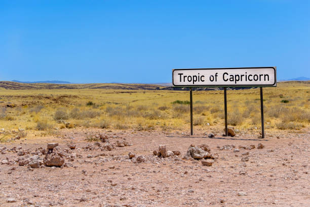 Tropic of Capricorn sign in the desert of Namibia Tropic of Capricorn sign in the desert of Namibia during a self drive road trip. tropic of capricorn stock pictures, royalty-free photos & images
