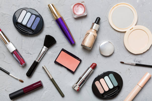 istock Professional makeup tools. Top view. Flat lay. Beauty, decorative cosmetics. Makeup brushes set and color eyeshadow palette on table background. Minimalistic style 1466343235