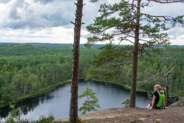 istock Woman hiking in forest 1466346108