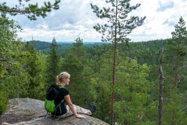 istock Woman hiking in forest 1466346121