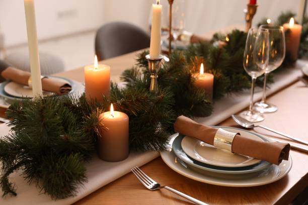 istock Luxury place setting with beautiful festive decor for Christmas dinner on wooden table 1466349095