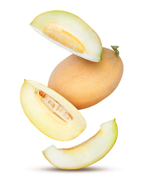istock Delicious ripe melons falling on white background 1466349417