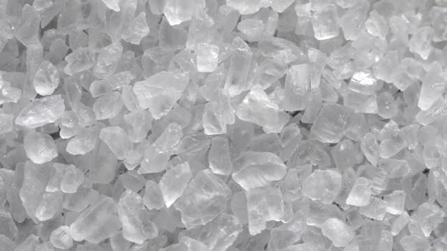 Salt grain crystals moving.