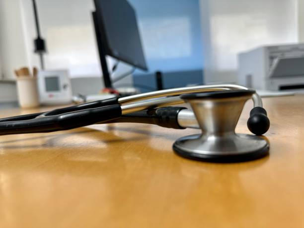 istock Stethoscope on table in medical examination room 1466359554