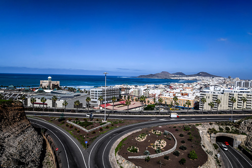 Puerto de la Cruz, Tenerife, Canary Islands, Spain - November 20, 2021: ample elevated views towards the part of the town with numerous hotels and holiday residences, entertainment and shopping areas.