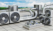 Commercial HVAC units on the rooftop of a building. Air conditioner units connected with steel pipes