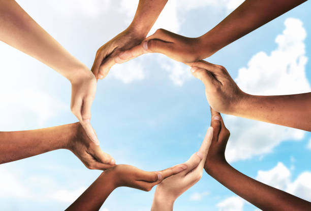 istock Symbol and shape of circle created from hands.The concept of unity, cooperation, partnership, teamwork and charity. 1466366607