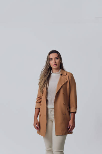 istock elegant and confident woman in studio photo 1466368162