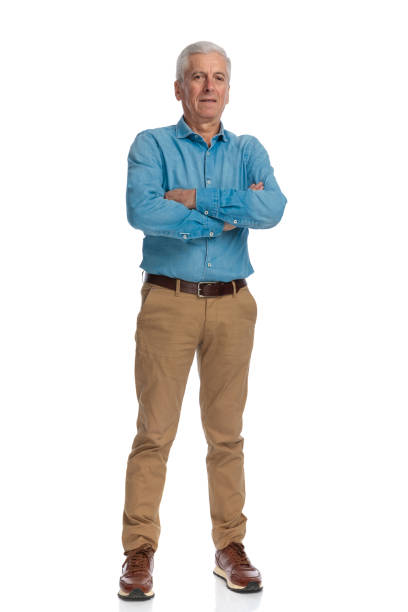 istock old man with grizzle hair crossing arms and posing while standing 1466373802