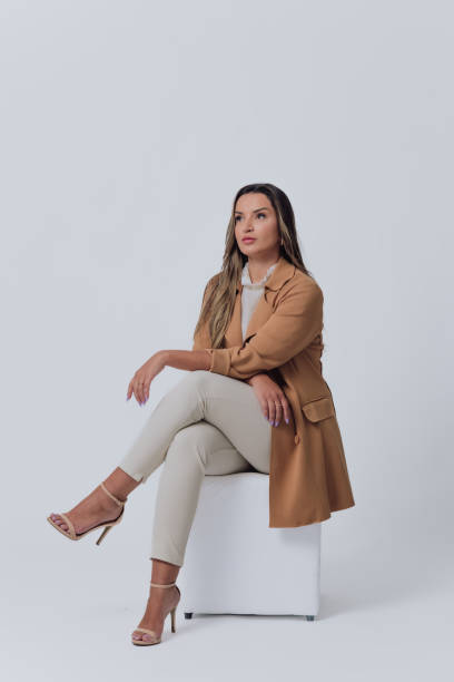 istock elegant and confident woman in studio photo 1466374822