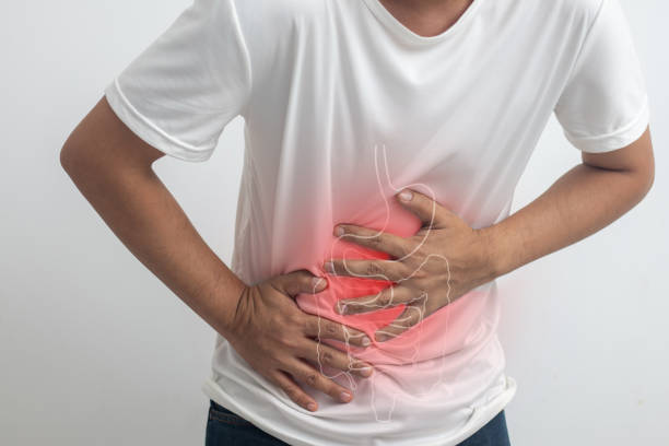 istock man having abdominal pain on white background 1466375047