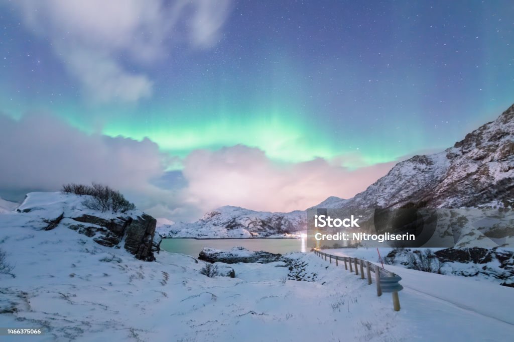 Northern Lights in winter landscape Northern Lights in winter landscape in Lofoten Islands, Norway Astronomy Stock Photo