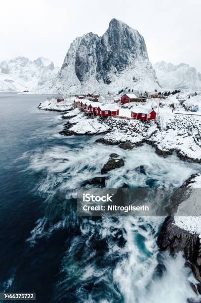 Hamnoy Town Under Heavy Snow Stock Photo - Download Image Now - Mountain, Nature, Overcast