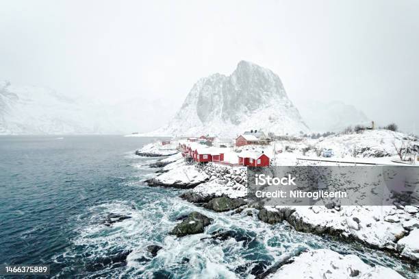 Hamnoy Town Under Heavy Snow Stock Photo - Download Image Now - Aquamarine, Atmospheric Mood, Bay of Water