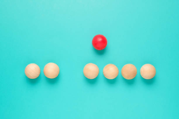 istock A different red ball being out of the row 1466381116