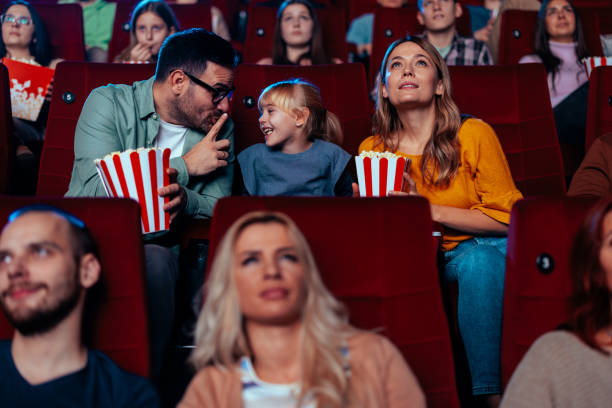 istock Child talking during movie projection. 1466383367
