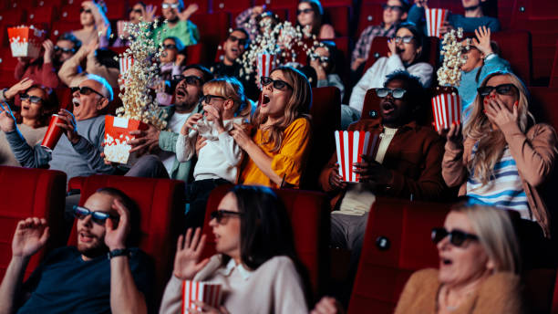 istock Scared people in movie theater. 1466383400